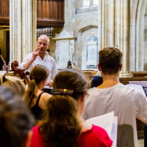 Jonathan Williams conducting the musicians of St Hilda's College, Oxford